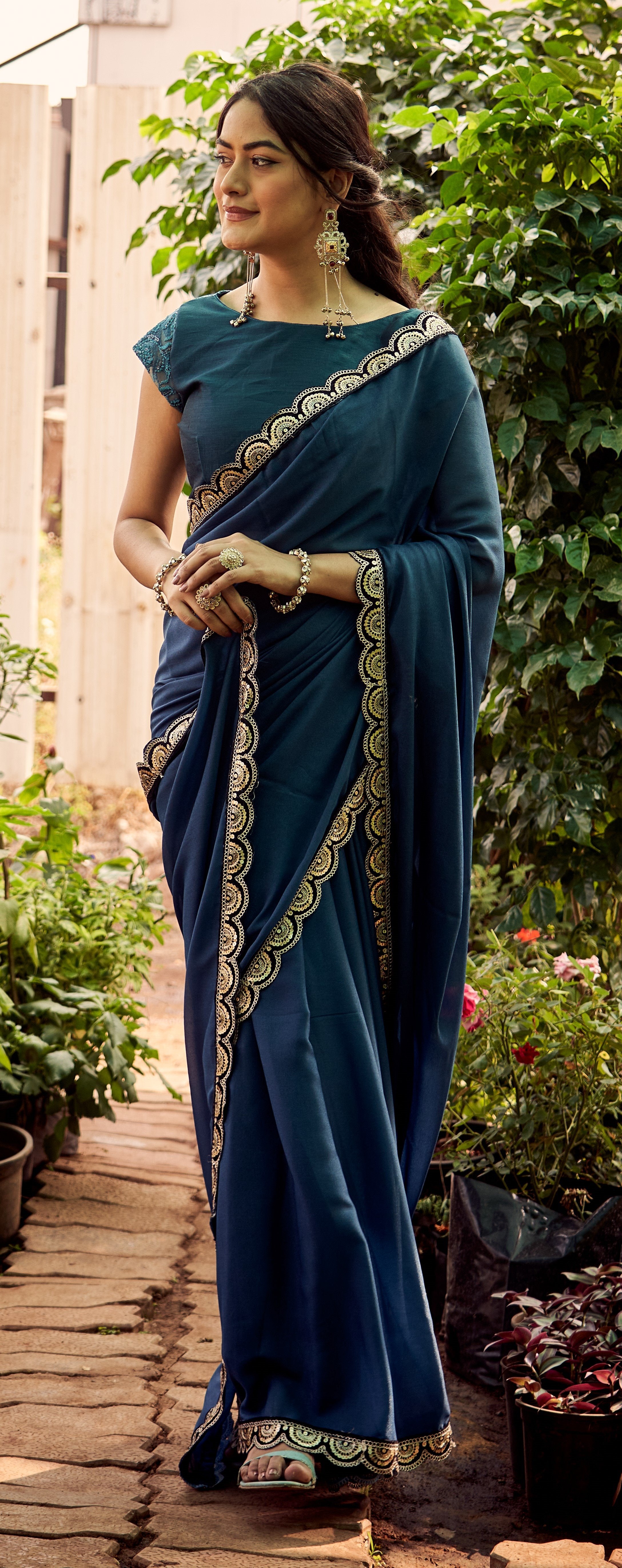 Elegant Navy Blue Saree with Intricate Lace Border