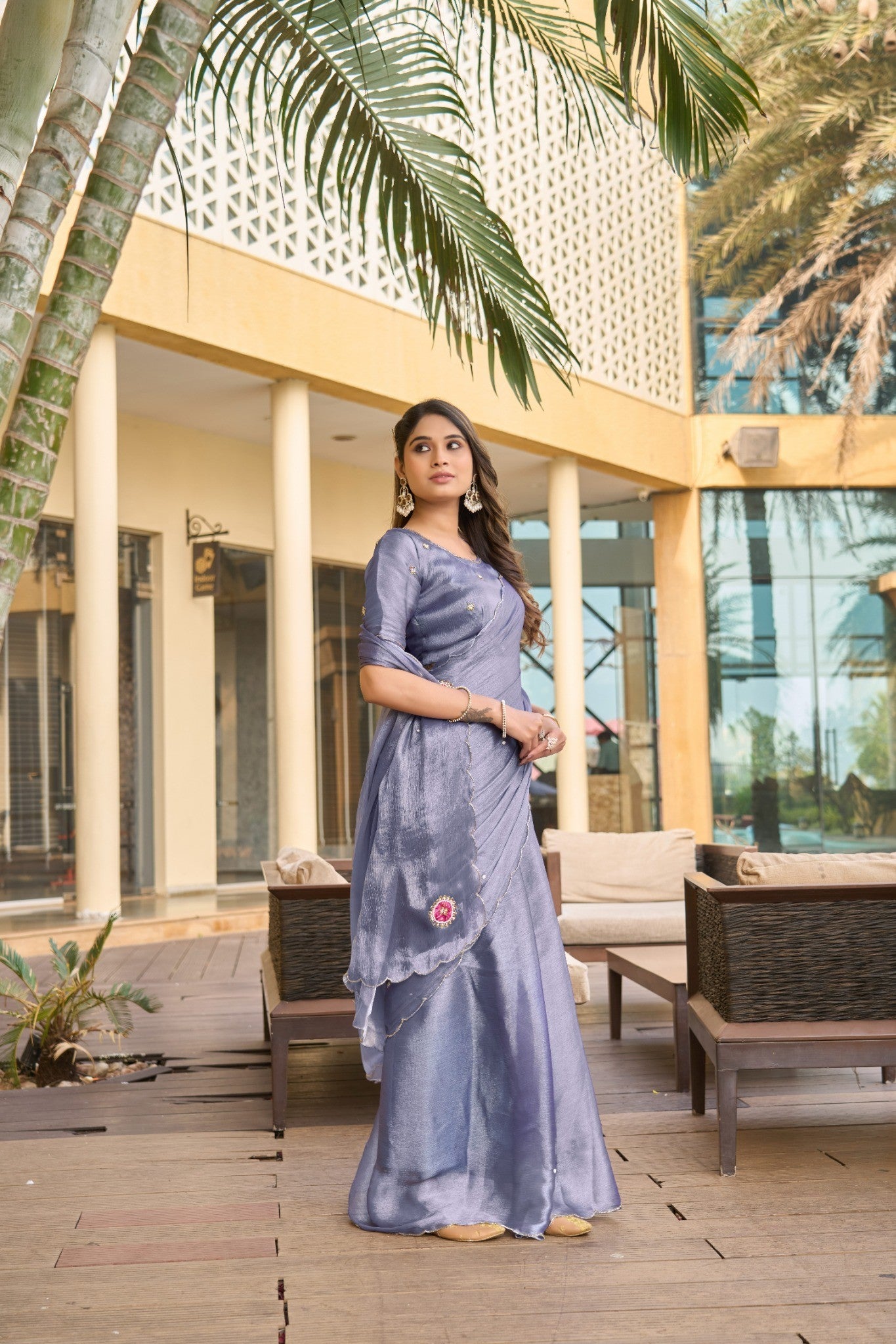 Aqua Blue Designer Saree with Minimal Floral Embroidery