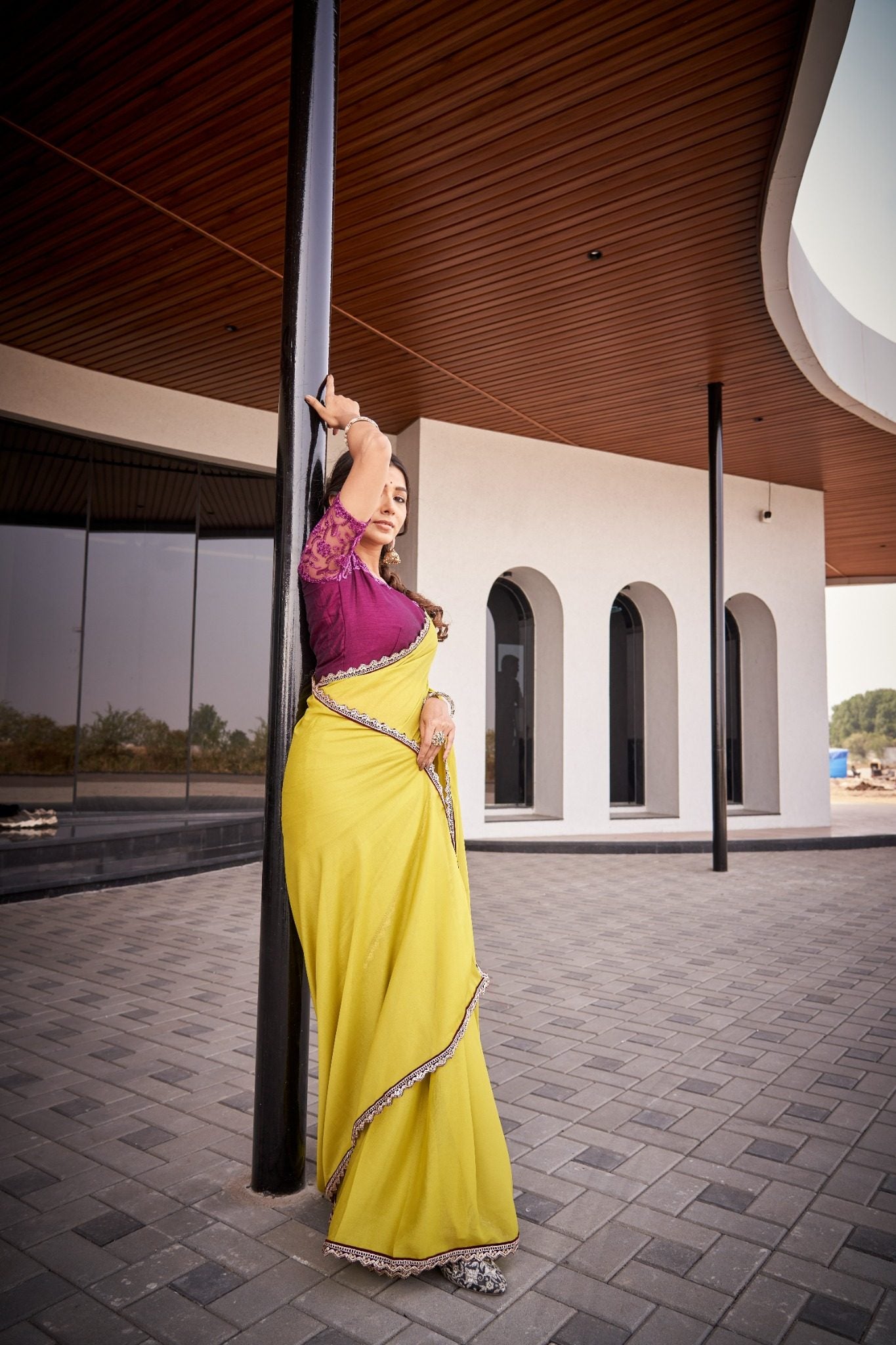 Mustard Yellow Organza Silk Blend Saree with Rich Embroidered Lace Border