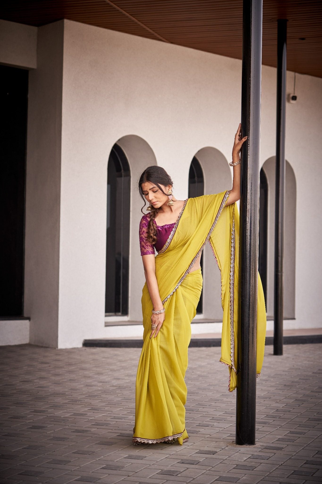 Mustard Yellow Organza Silk Blend Saree with Rich Embroidered Lace Border