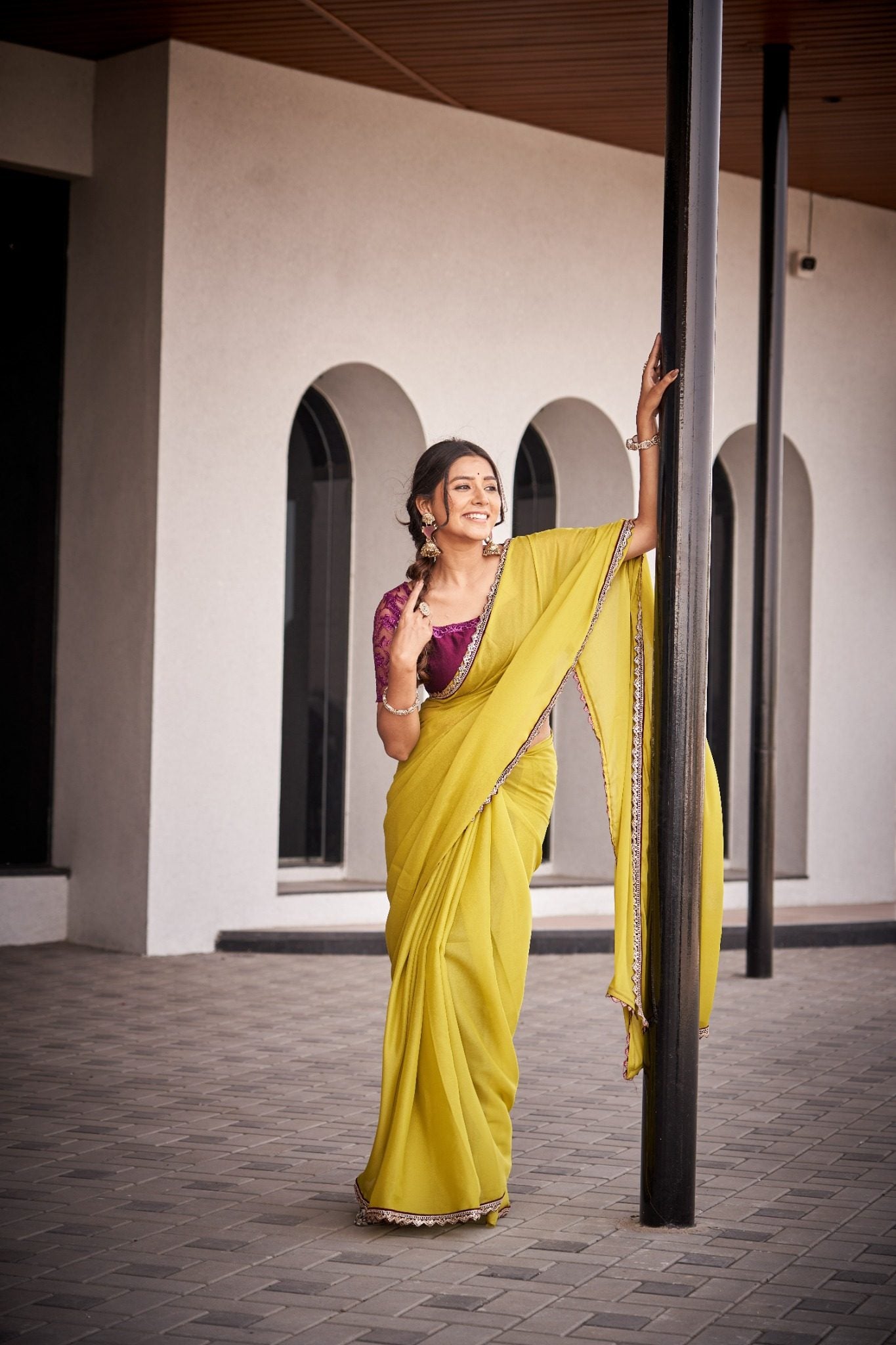 Mustard Yellow Organza Silk Blend Saree with Rich Embroidered Lace Border