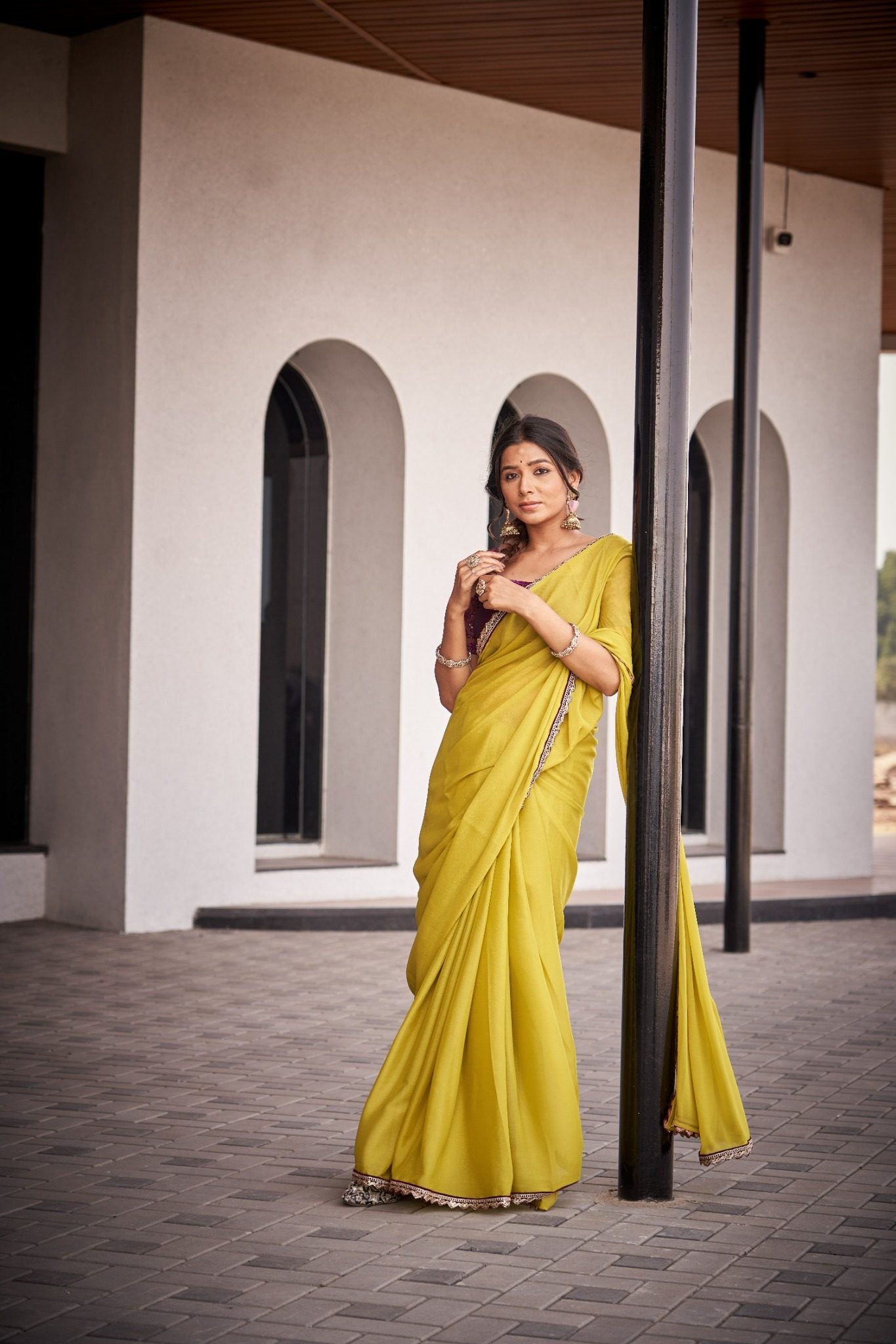 Mustard Yellow Organza Silk Blend Saree with Rich Embroidered Lace Border