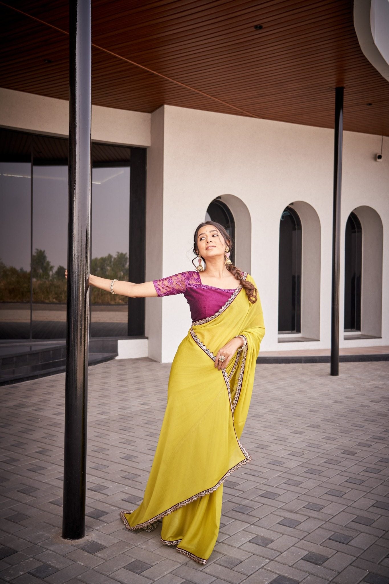 Mustard Yellow Organza Silk Blend Saree with Rich Embroidered Lace Border